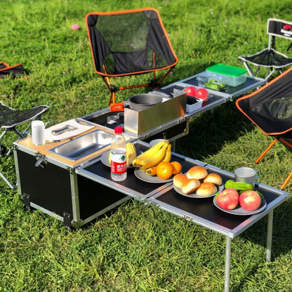 Portable kitchen with side tables for food