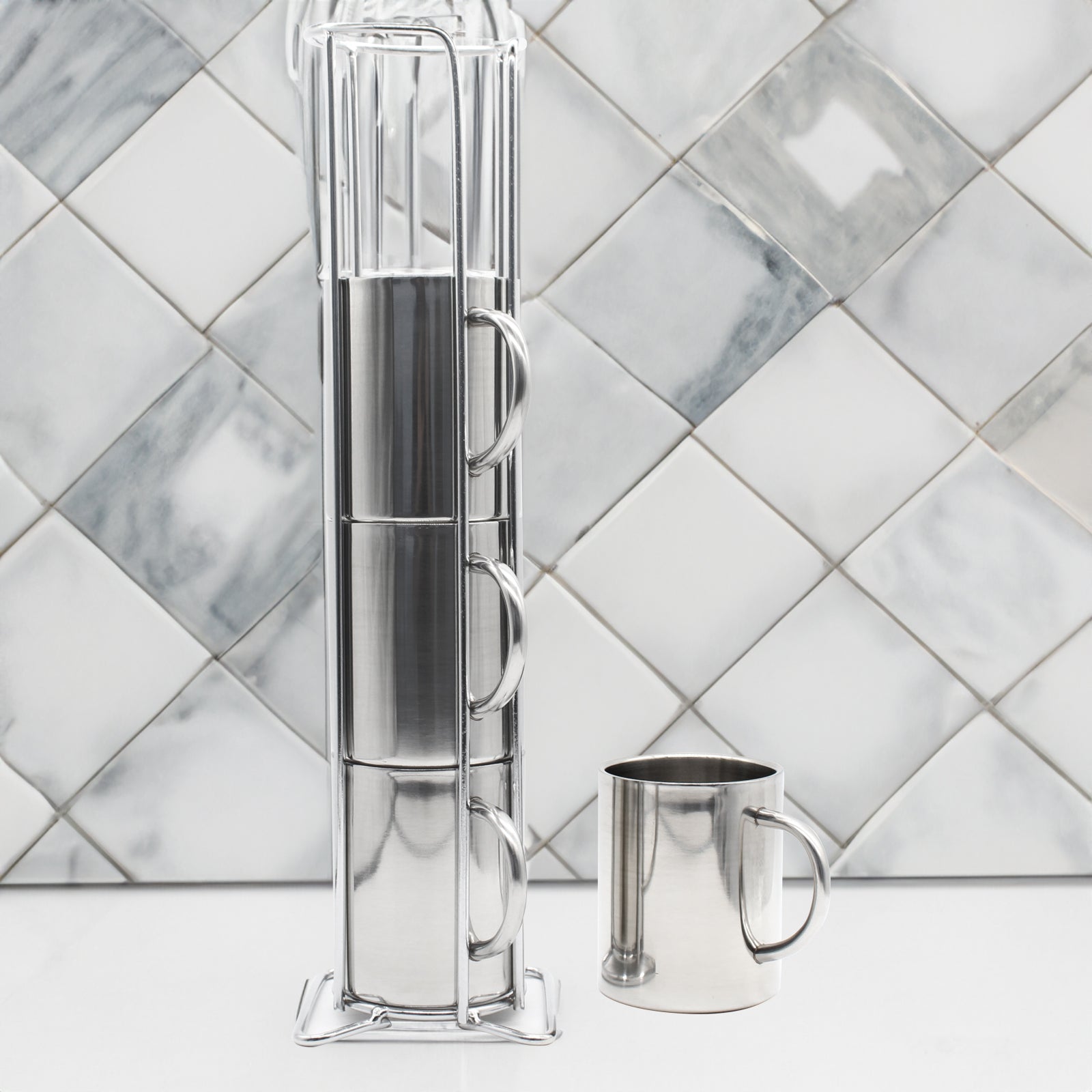 Stainless Steel Mugs in Tower on Kitchen Side