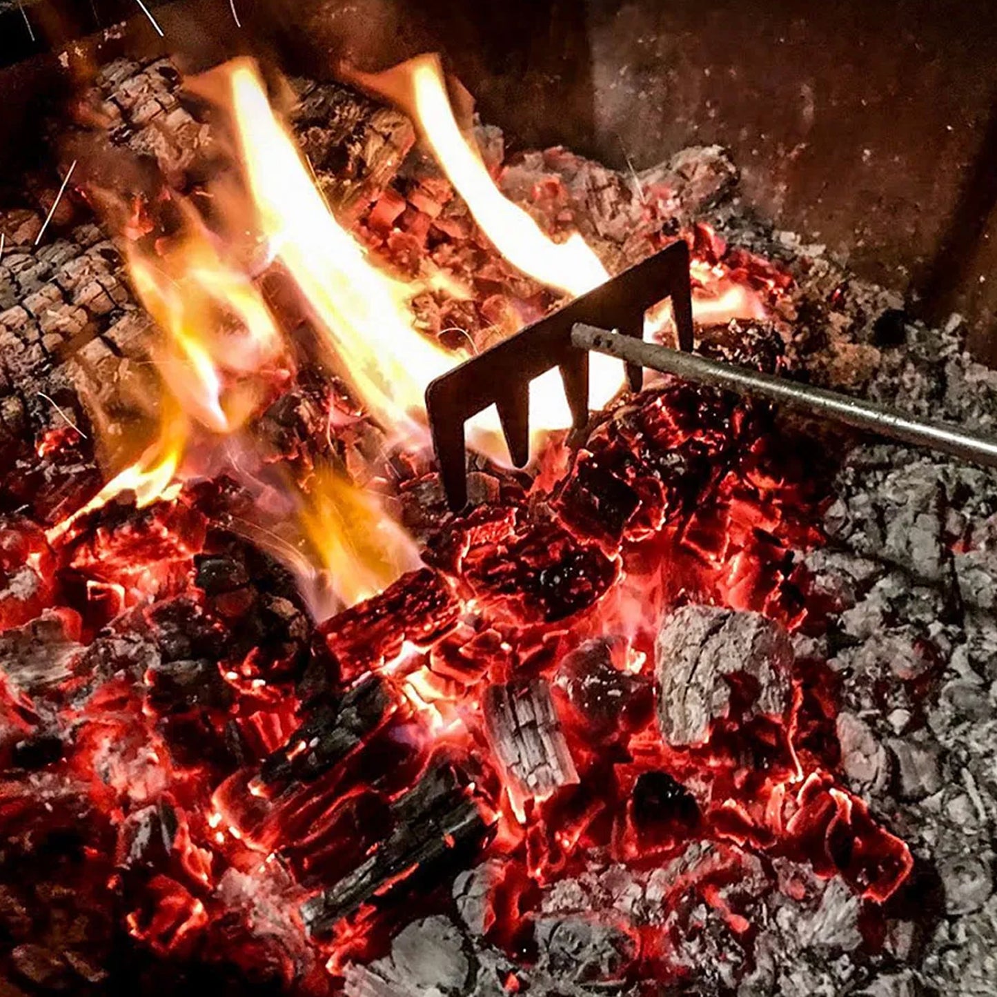 Coal Rake Moving Hot Coals